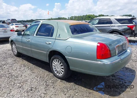 2005 Lincoln Town Car Signature из США, поврежденный, VIN 1LNHM81W55Y664694